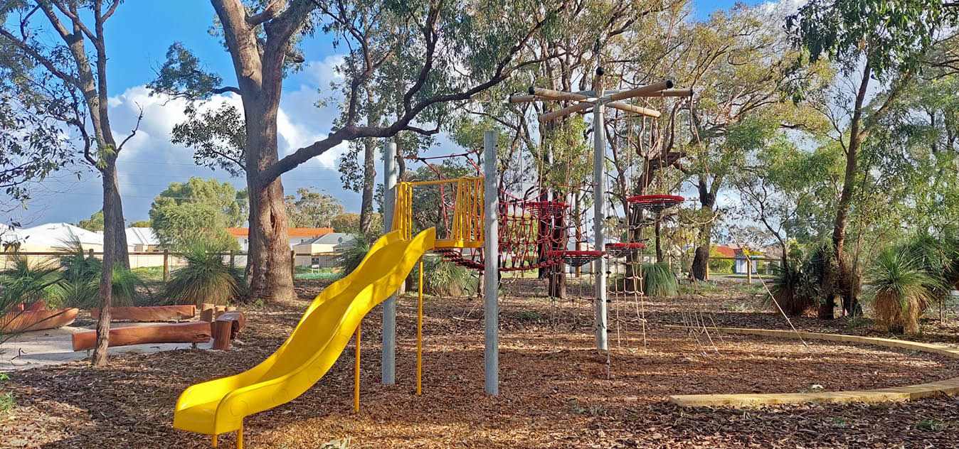 Net climbing tower with slide