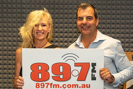 89.7 FM announcer Sue Myc with Mayor Mark Irwin