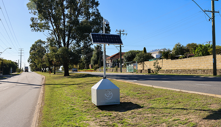 A near miss camera on site in a park.