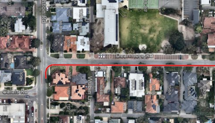 Aerial map showing a section of Deanmore Road with a highlighted red line marking a proposed no-stopping zone along the southern side of the street between Calais Road and nearby residential propertie