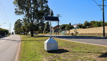 A near miss camera on site in a park.