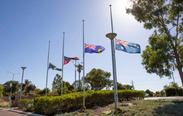 The City's flags at half-mast