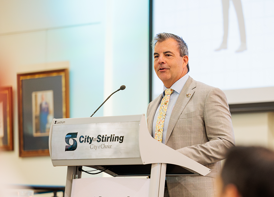 Mayor Mark Irwin speaks at the City's Investment Attraction Breakfast in March.