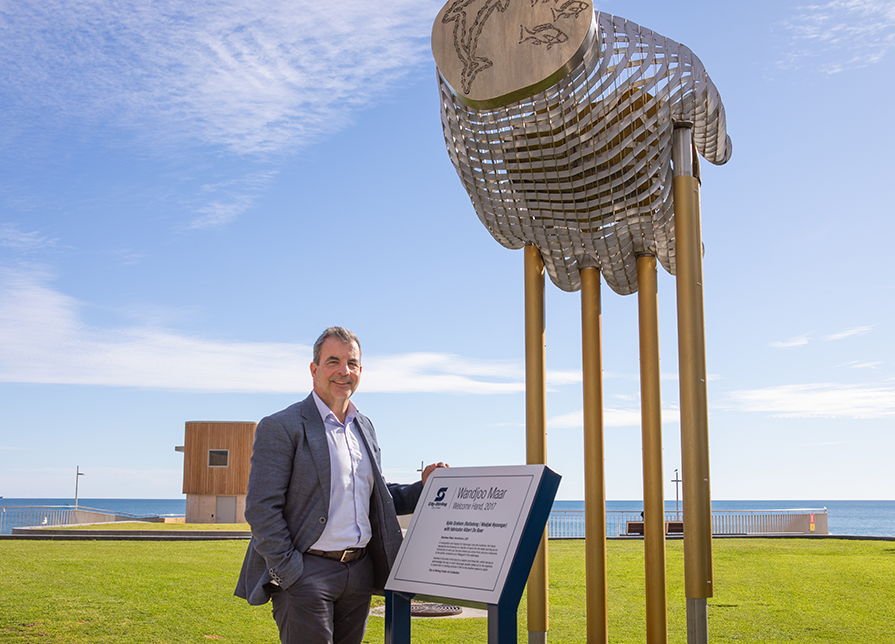 City of Stirling Mayor Mark Irwin AM at Scarborough Beach at the site of the refreshed Wandjoo Maar, Welcome Hand by Wadjak Nyoongar artist Kylie Graham.